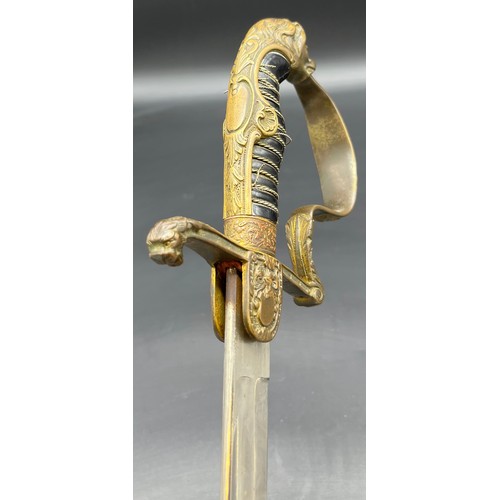 533 - A German Cavalry sword, Lion head pommel. Comes with a scabbard- not true to this sword.