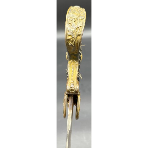 533 - A German Cavalry sword, Lion head pommel. Comes with a scabbard- not true to this sword.