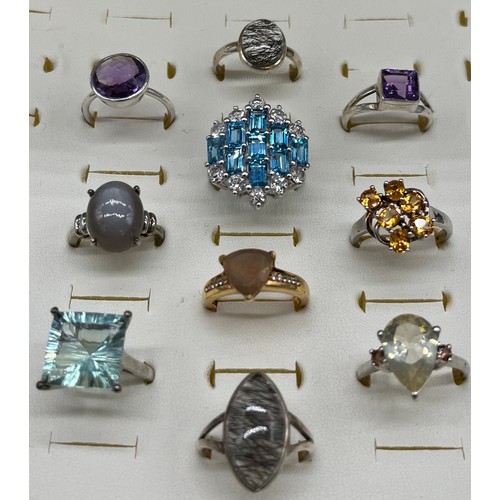 537 - A Collection of Ten 925 silver and gem stone rings.