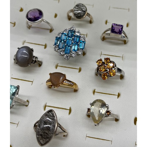 537 - A Collection of Ten 925 silver and gem stone rings.