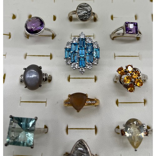 537 - A Collection of Ten 925 silver and gem stone rings.