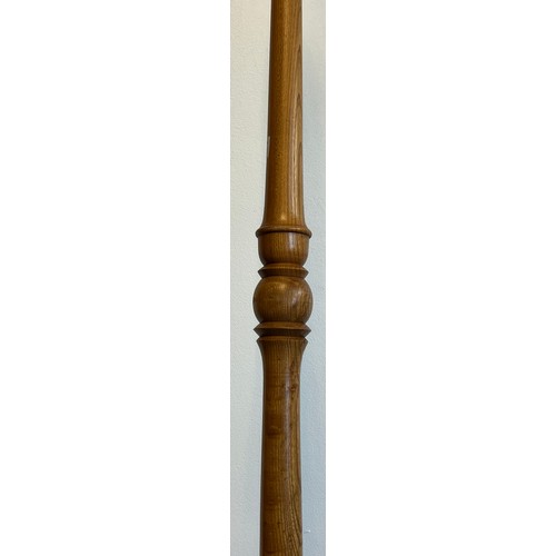 880 - Light wood floor standing lamp fitted with A Military Naval brass propeller. Stamped Banford & Co Lt... 