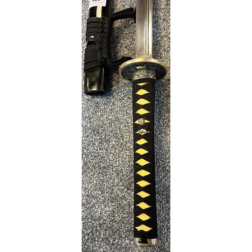 820 - Replica display samurai sword with black lacquered scabbard.