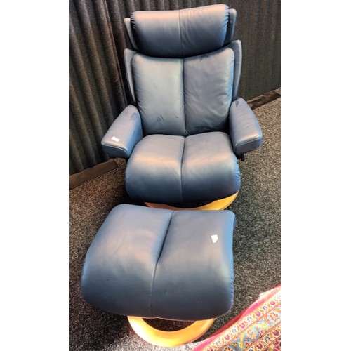 815 - Ekorness blue stressless leather relaxer chair together with matching pouffe.