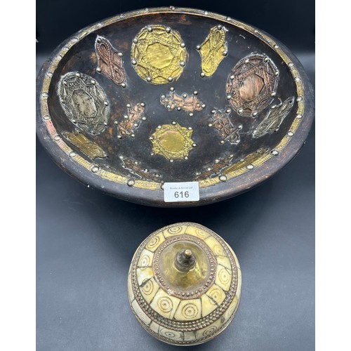 616 - Large wooden bowl designed with metal work and stud finish. Together with a metal work and bone trin... 