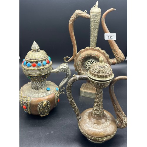 622 - A Lot of three Tibetan tea pots, made from copper, brass and possible silver mounts. [Tallest 35cm]