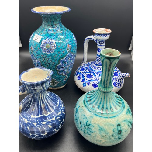 627 - Four pieces of Indian porcelain to include Multan bottle neck jug, Celadon glaze vase. and two other... 