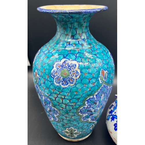 627 - Four pieces of Indian porcelain to include Multan bottle neck jug, Celadon glaze vase. and two other... 