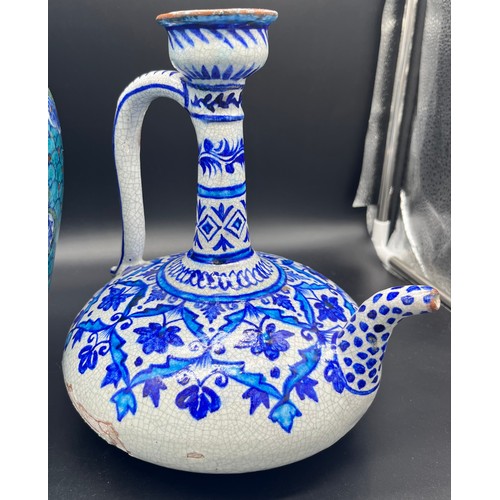 627 - Four pieces of Indian porcelain to include Multan bottle neck jug, Celadon glaze vase. and two other... 