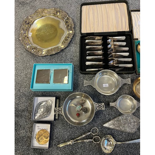 748 - A Collection of silver plated and E.P Wares to include pewter quaich's boxed cutlery sets and presen... 