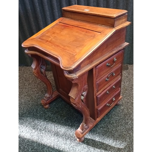 811 - A Reproduction Davenport 8 drawer desk. [83x54x54cm]