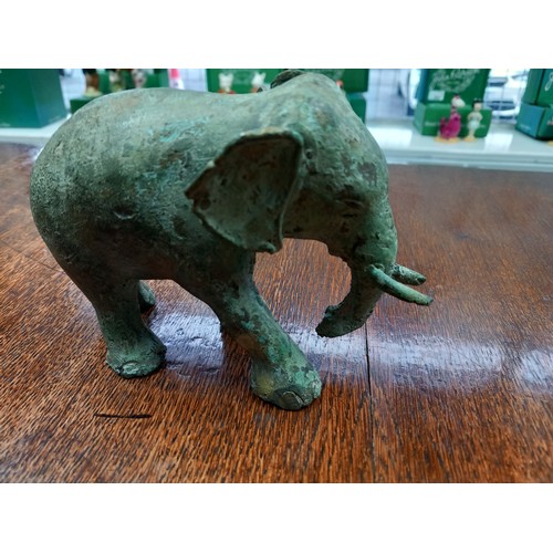 628 - A Lot of Asian Bronze and brass collectables. Includes antique bronze elephant, African bronze worke... 