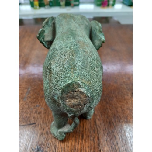 628 - A Lot of Asian Bronze and brass collectables. Includes antique bronze elephant, African bronze worke... 