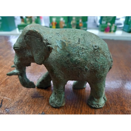 628 - A Lot of Asian Bronze and brass collectables. Includes antique bronze elephant, African bronze worke... 