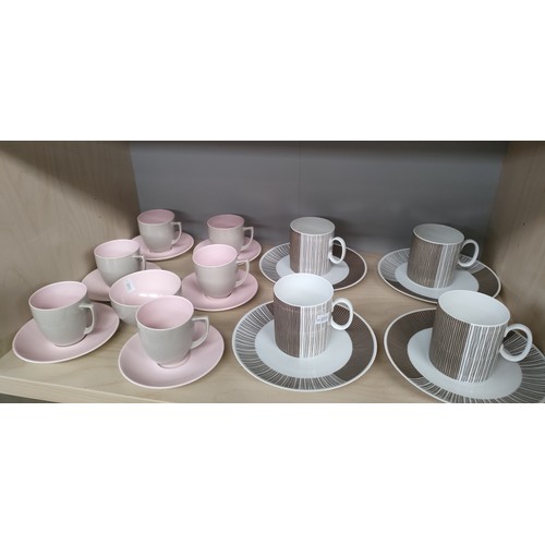 89 - Three shelves of retro coffee services to include Gold and black Portmeirion pottery service, Thomas... 