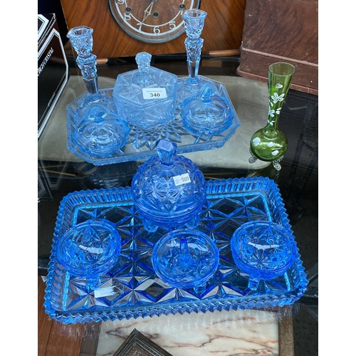 340 - Two Art Deco inspired blue glass dressing table sets and green glass vase.