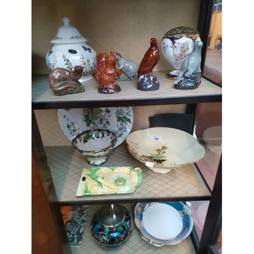 360 - Three shelves of collectables to include Masons, Beswick, Anysley, Newport pottery biscuit barrel an... 