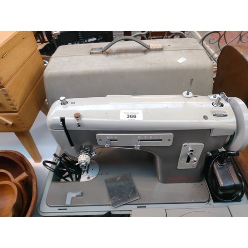 366 - Vintage Merritt sewing machine.