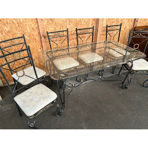 342 - Modern heavy wrought iron dinning table with glass top with 6 chairs