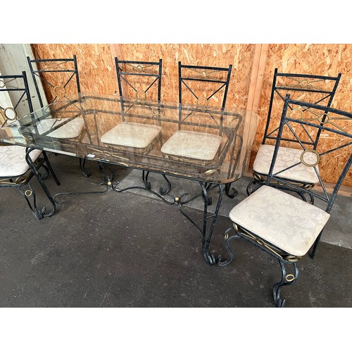 342 - Modern heavy wrought iron dinning table with glass top with 6 chairs