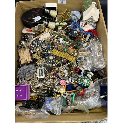 45 - A Box containing a large quantity of costume jewellery and some items of porcelain. Includes various... 