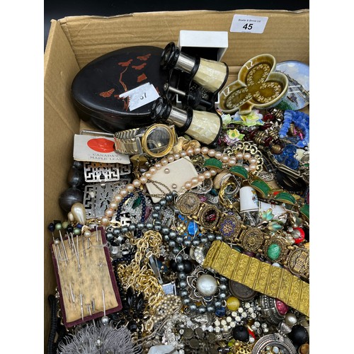 45 - A Box containing a large quantity of costume jewellery and some items of porcelain. Includes various... 