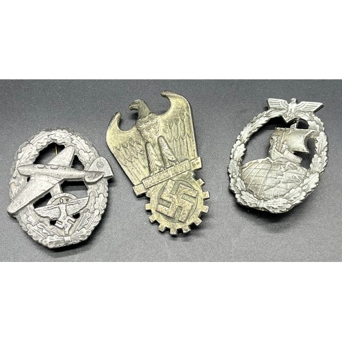 17A - Three assorted reproduction German WW2 badges.