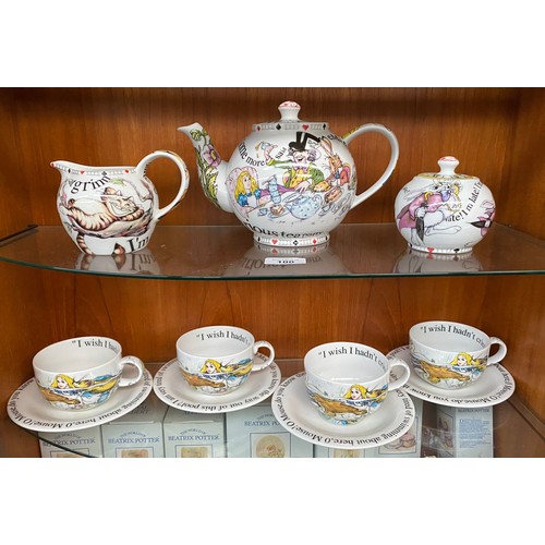 100 - Alice in wonderland tea service including tea pot by Paul Cardew