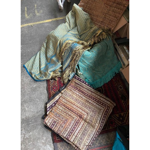 91 - A Vintage wicker basket containing oriental kimono silk robe , eastern rugs & throws etc