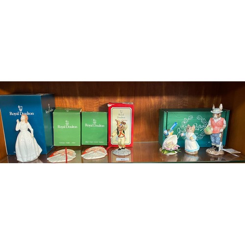 83 - A shelf of Royal and Beswick figures includes gardener rabbit, Doulton figure joy, Royal doulton San... 