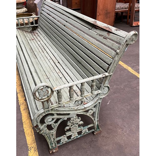 245 - Large Antique Cast iron and wooden slat bench.