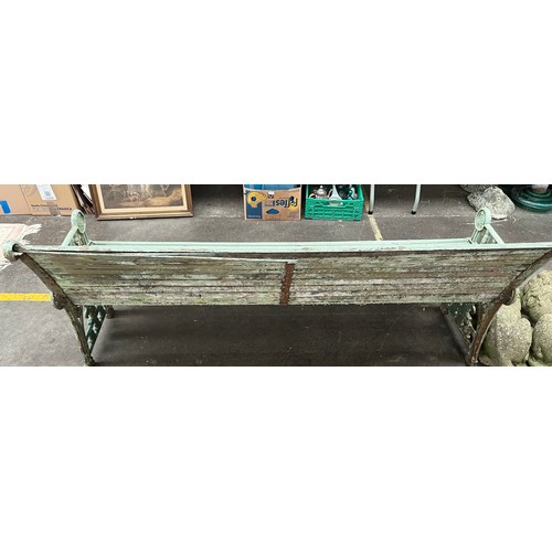 245 - Large Antique Cast iron and wooden slat bench.