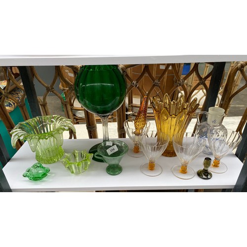 256 - A Collection of art glass to include possible early Scottish double handle green cup, Large green go... 