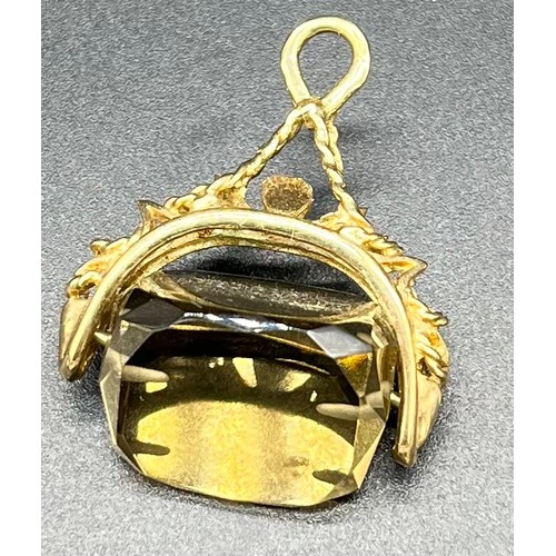 43 - 9ct gold fob fitted with a smokey quartz stone