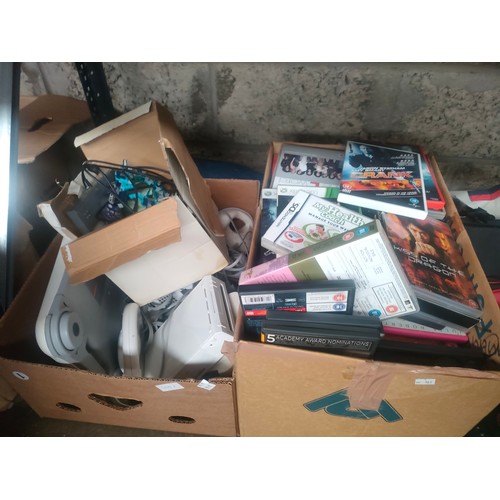 499F - Box of Nintendo Wii consoles and accessories together with a box of DVD's etc