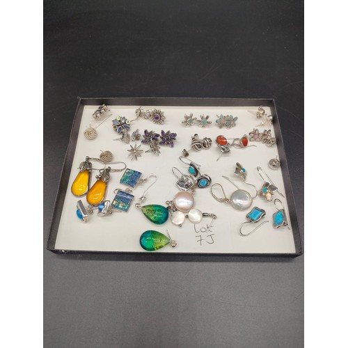 7J - A Collection of silver earrings, includes silver and enamel earrings, amber, opal and pearl earrings... 