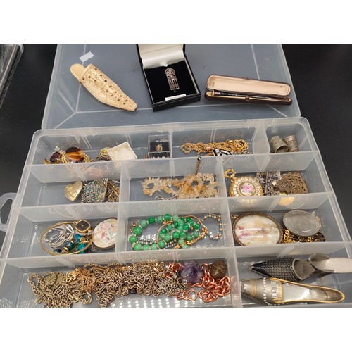 29J - A Tub containing a quantity of mixed costume jewellery, silver jewellery and coins.