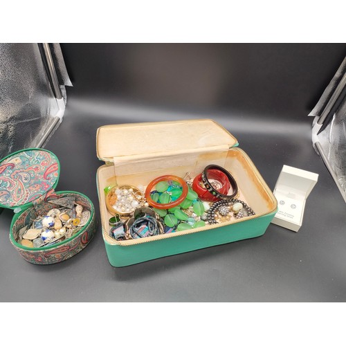 9J - A Jewellery box containing a quantity of costume jewellery, include Rolled gold bangle, earrings, Pl... 