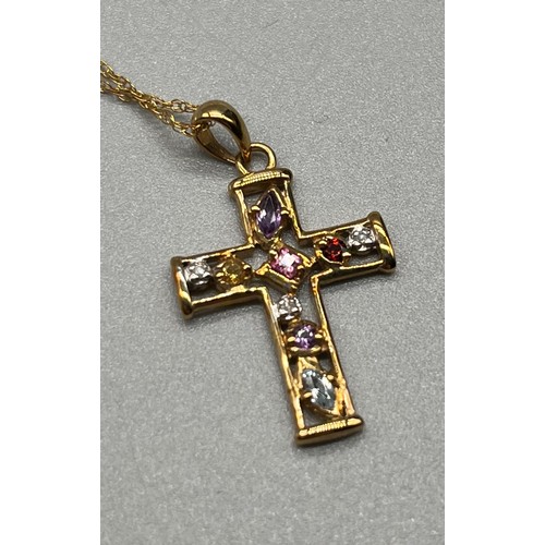 7 - 9ct yellow gold and gem stone cross pendant. fitted with diamonds, amethyst and citrine stones. Come... 