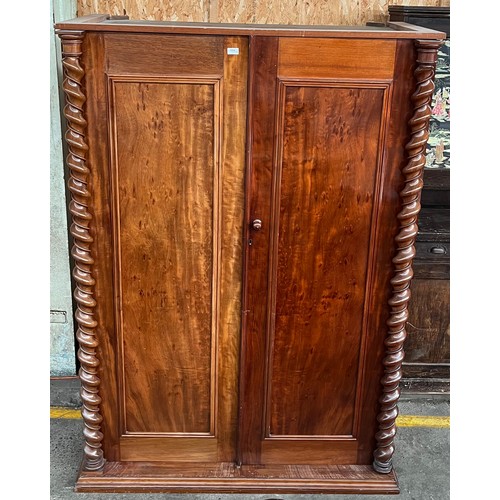 162 - 19th century burr walnut wardrobe, the two long doors opening to interior storage, flanked by barley... 