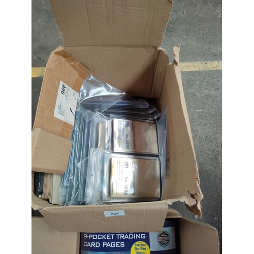 228 - 2 Boxes of pocket trading card cases