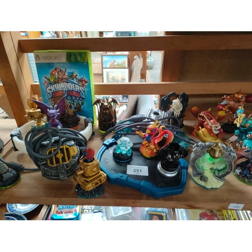 251 - Shelf of Skylanders figures