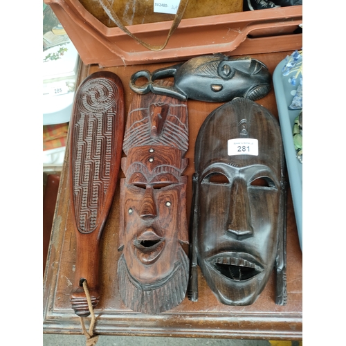 281 - A selection of African masks etc