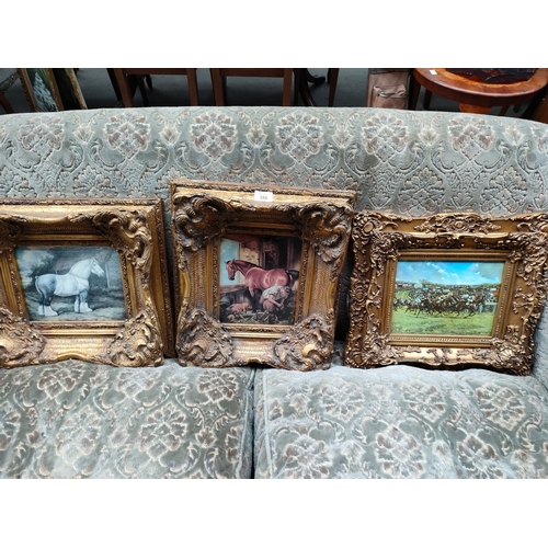 355 - 3 horse scene pictures fitted in heavy gilt framing