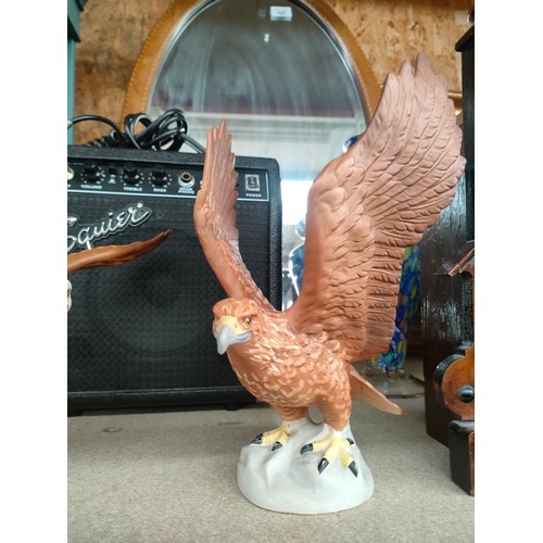 154 - Beswick golden eagle together with bald eagle