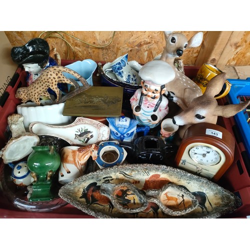 143 - A Large crate of collectables includes studio pottery , deer figures etc