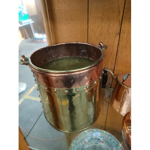 123 - Shelf of antique copper ware includes drinks pourer etc