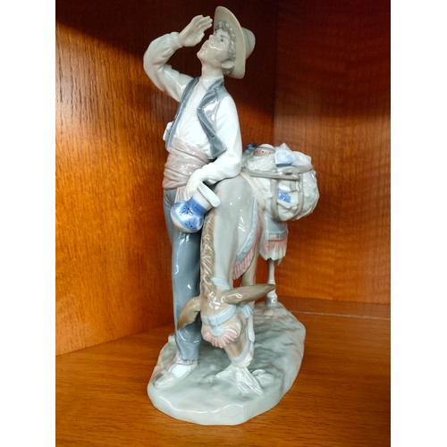 115 - 2 Large Lladro figures includes Peddler man with donkey