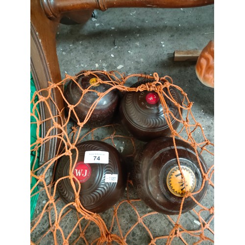 74 - Set of 4 vintage wooden bowling bowls