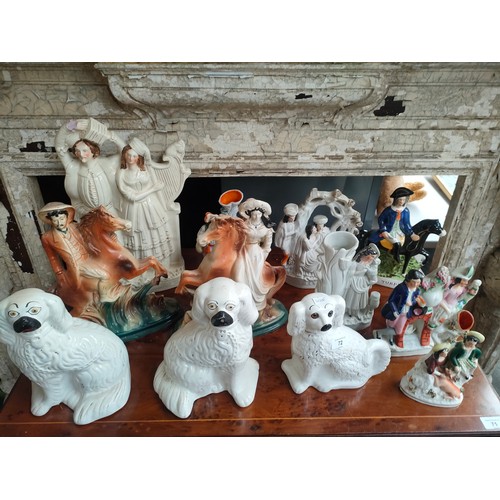 72 - A Large collection of Victorian Staffordshire flat back figurines